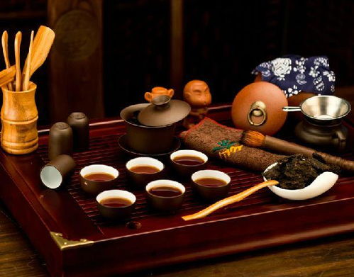 中式客廳實木茶具套裝裝修效果圖與家用電器的融合